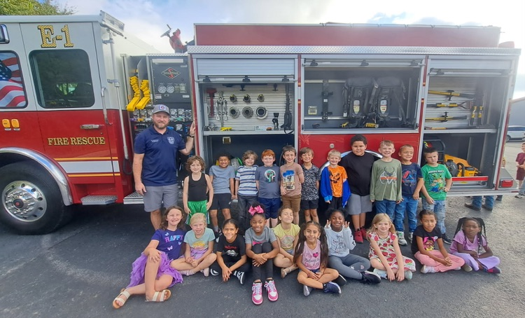 students with the fire truck