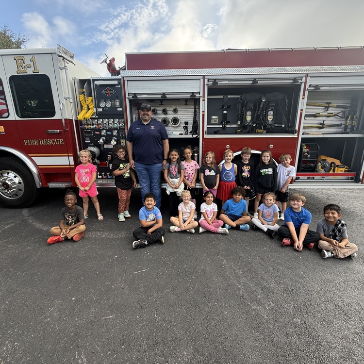 students with the fire truck