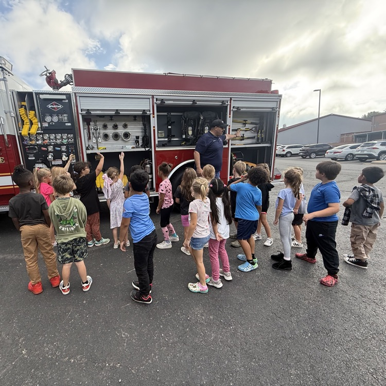 students with the fire truck