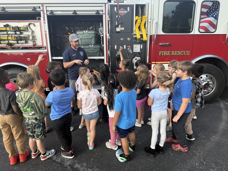 students with the fire truck