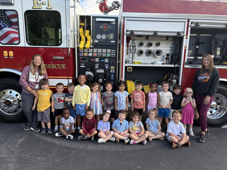students with the fire truck