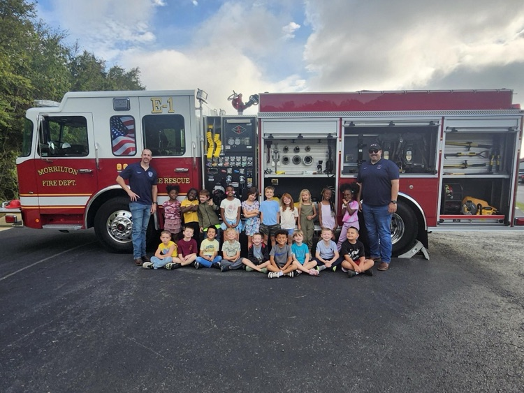 students with fire truck