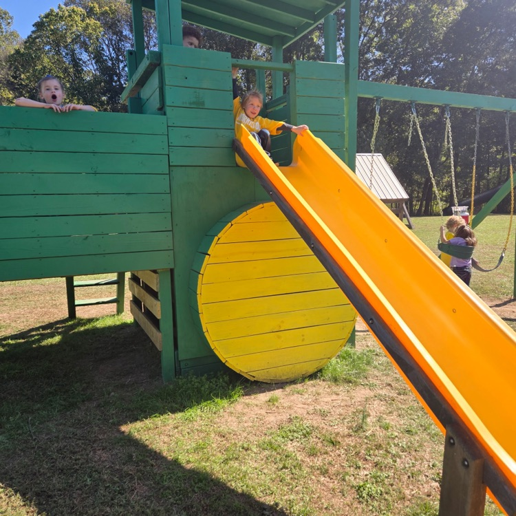 child on slide