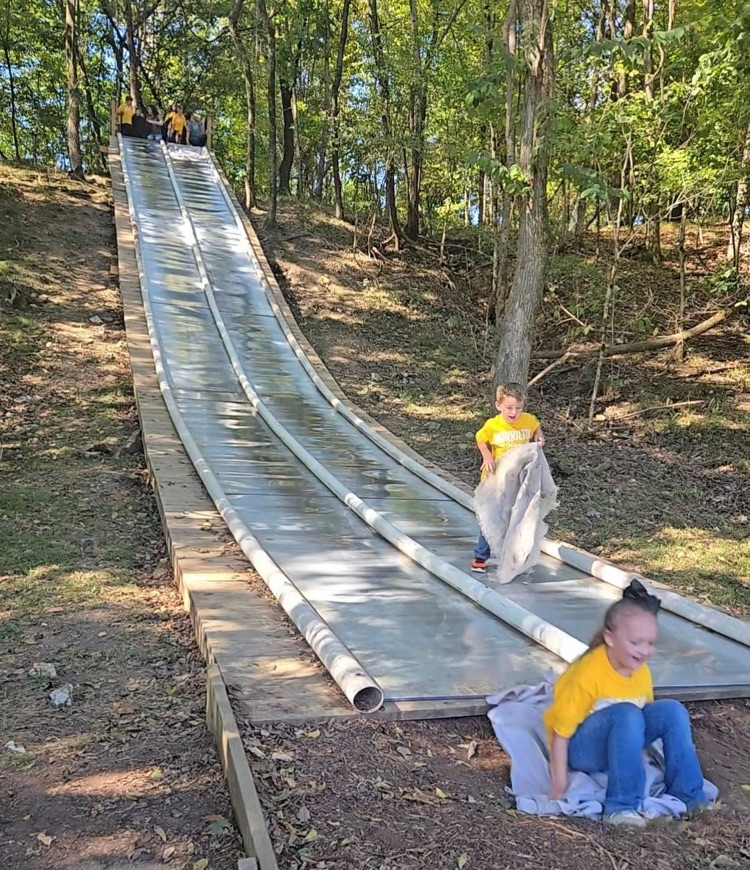 child on slide