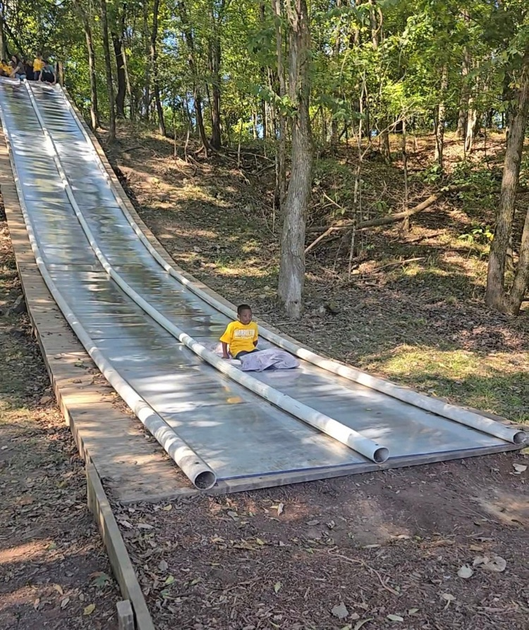 child on slide