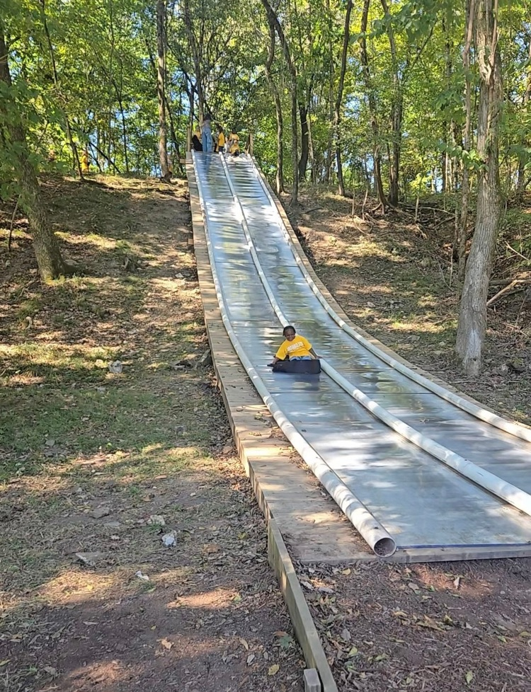 child on slide
