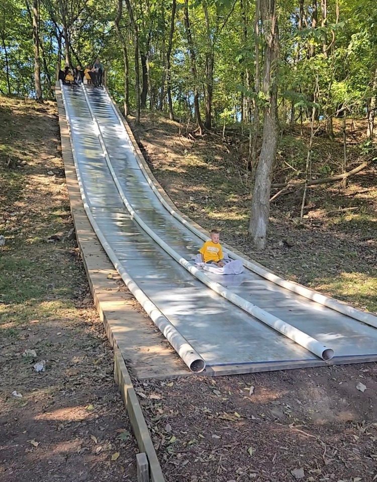 child on slide