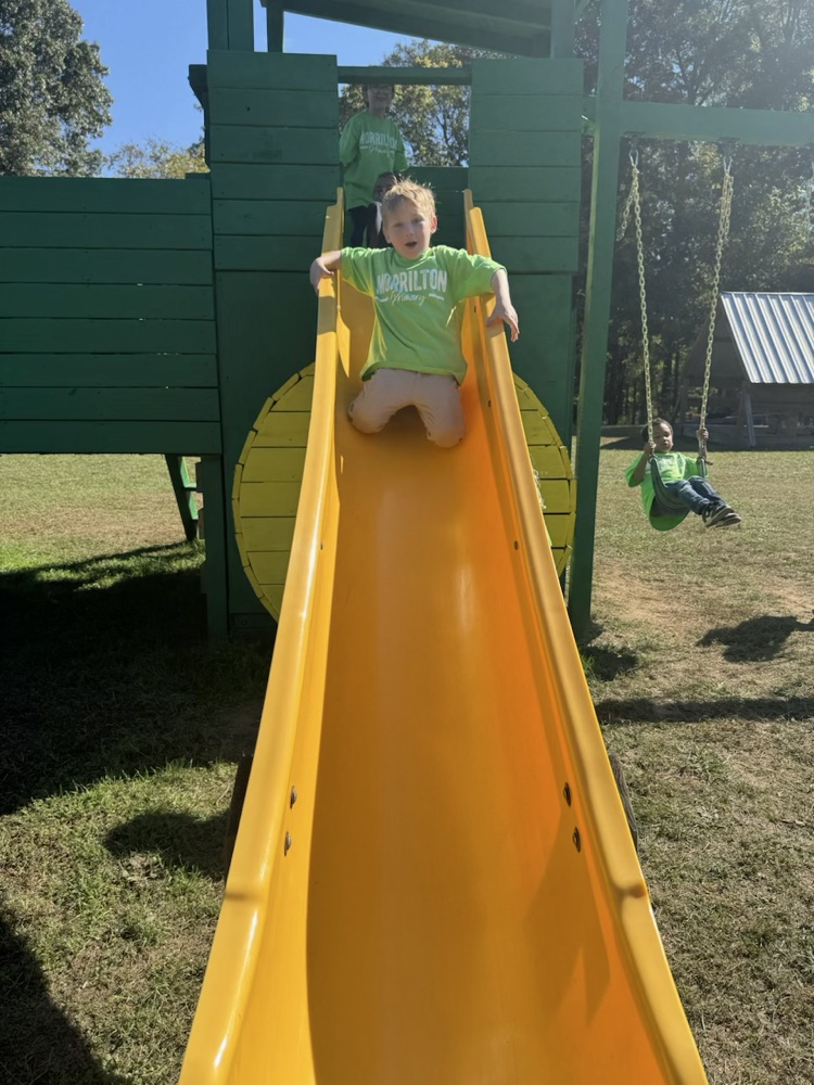 child on slide