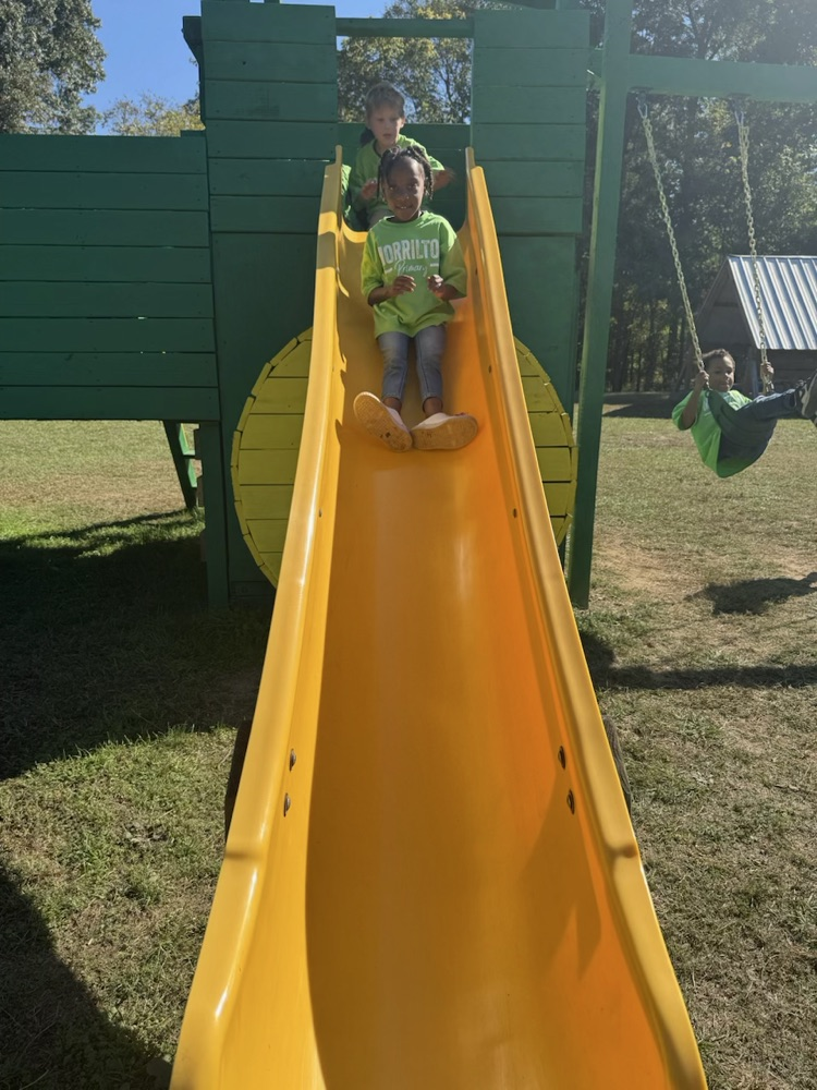 child on slide
