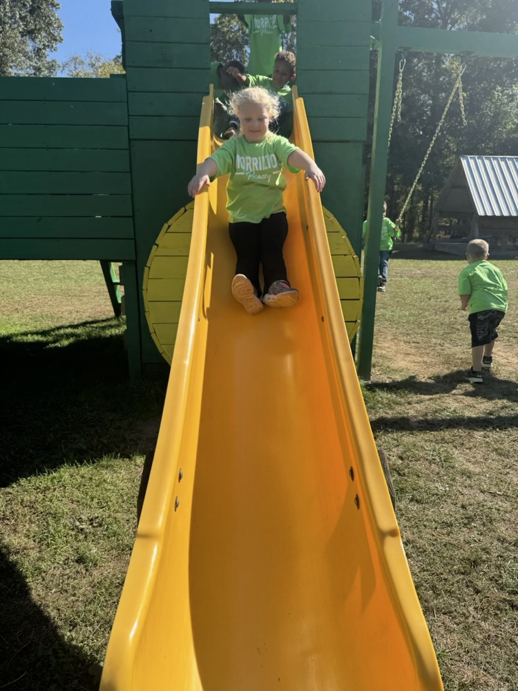 child on slide