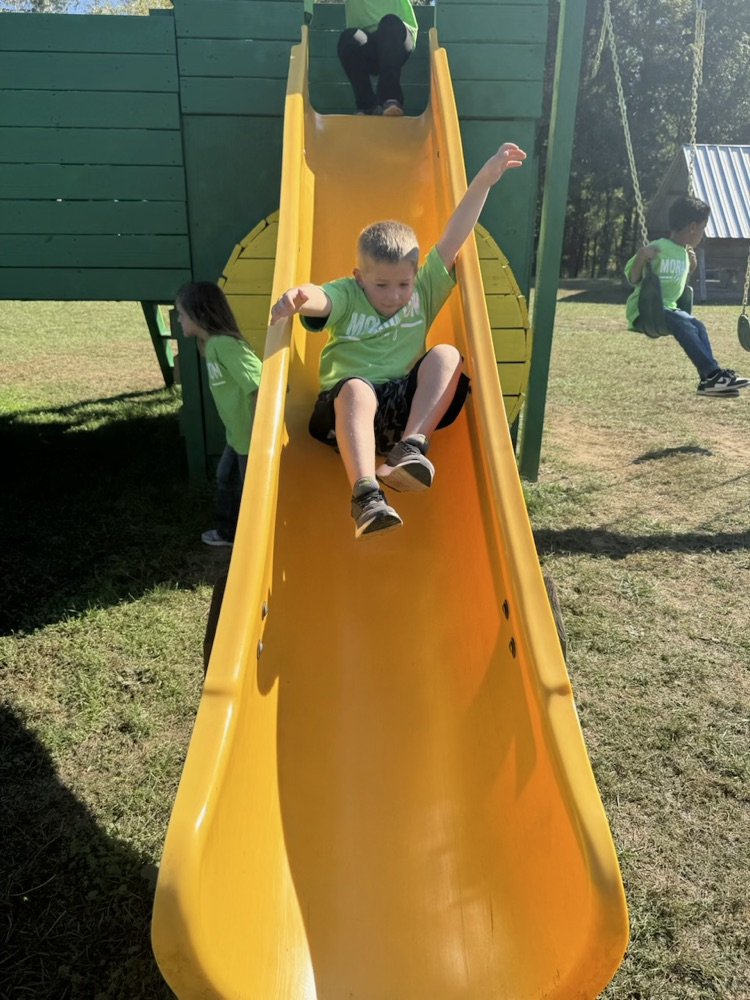 child on slide