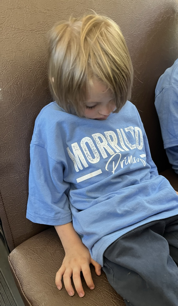 child asleep on bus