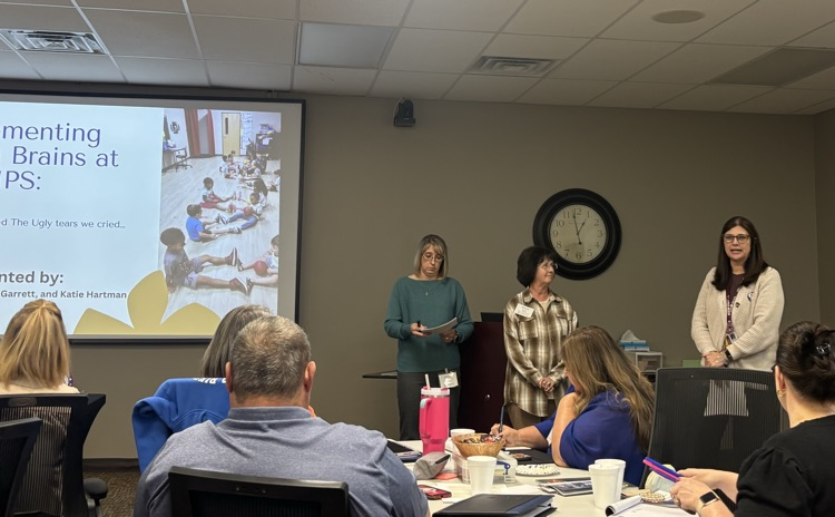 Staff members speaking