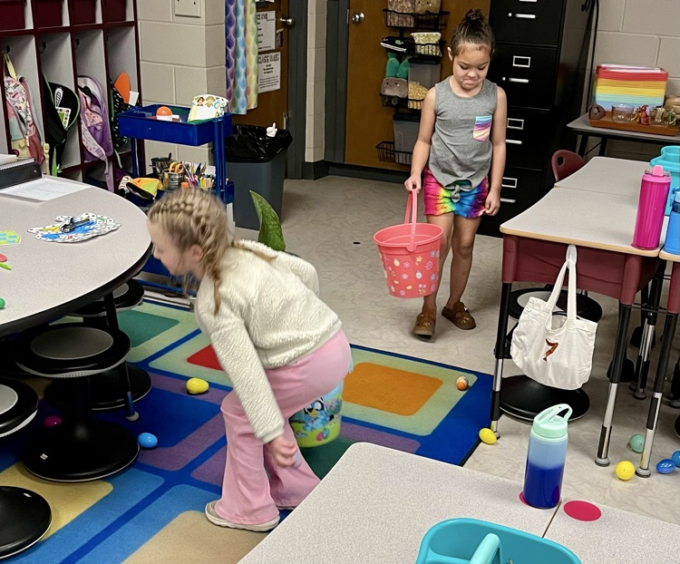 students hunting eggs 