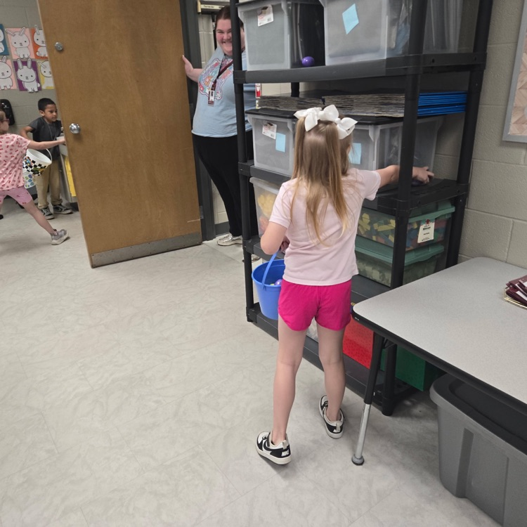 students hunting eggs