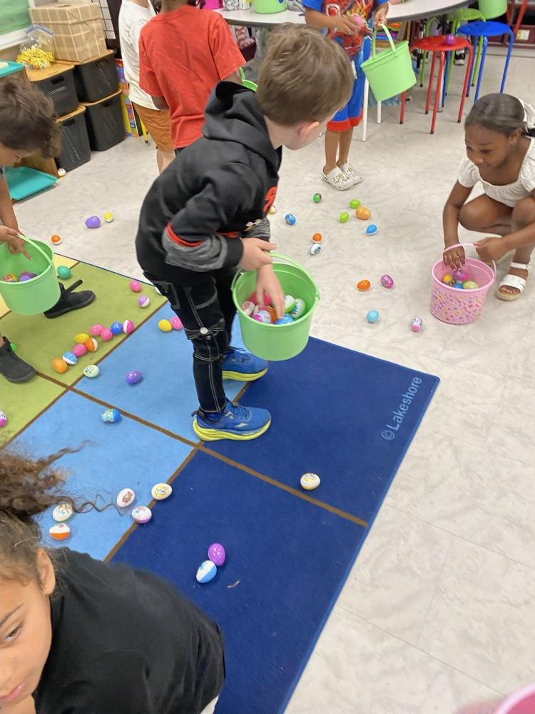 children hunting eggs