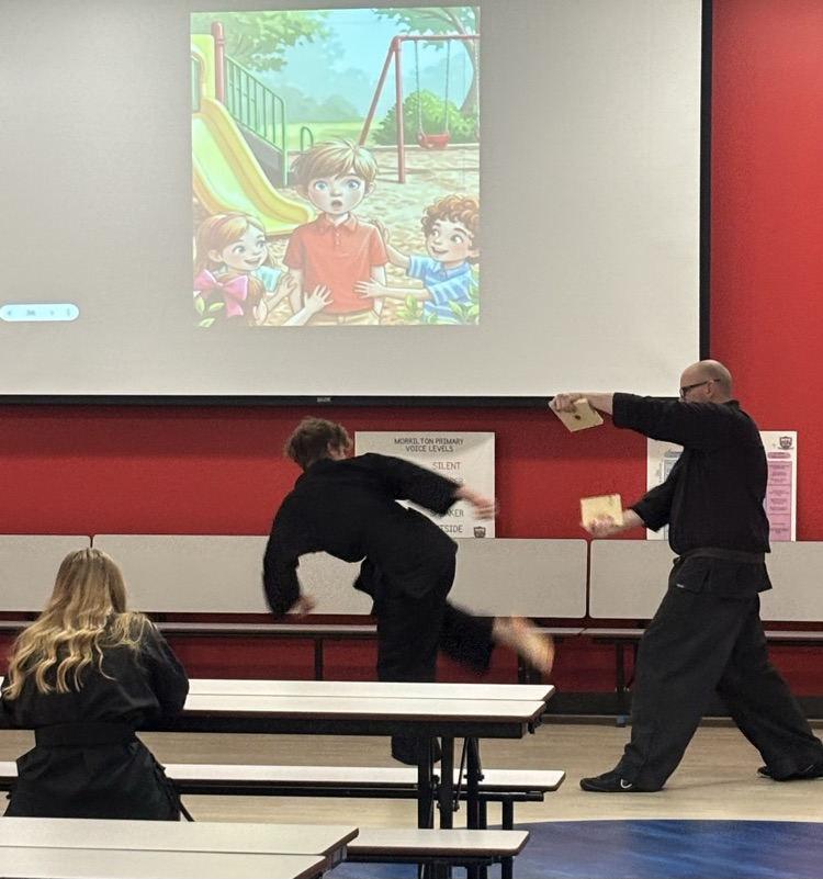 student breaking a board 
