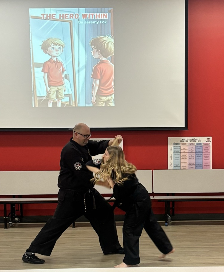 student breaking a board 