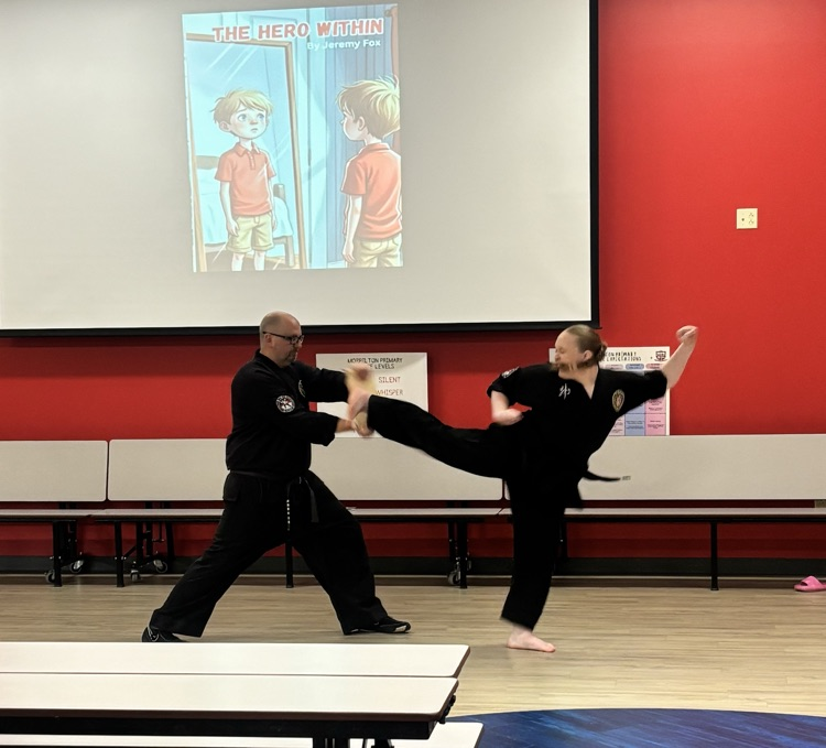 student breaking a board 
