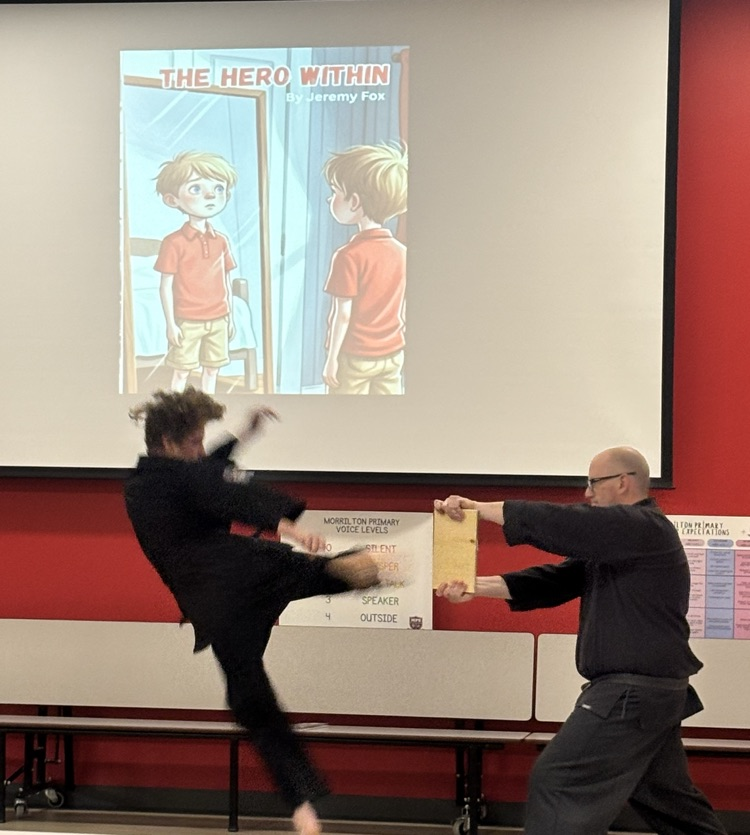 student breaking a board 