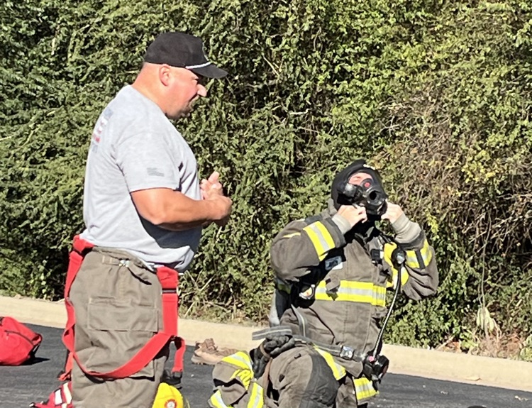 fireman, putting on gear