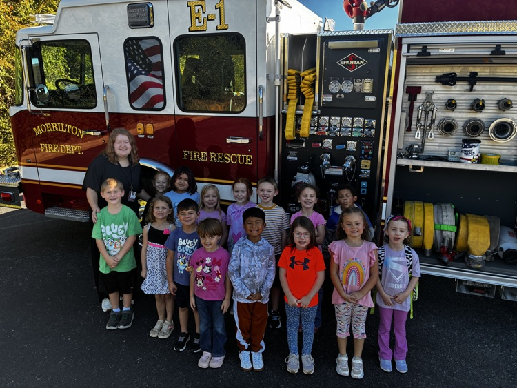 students with fire truck