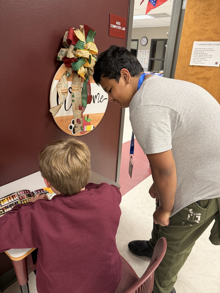student working with student 