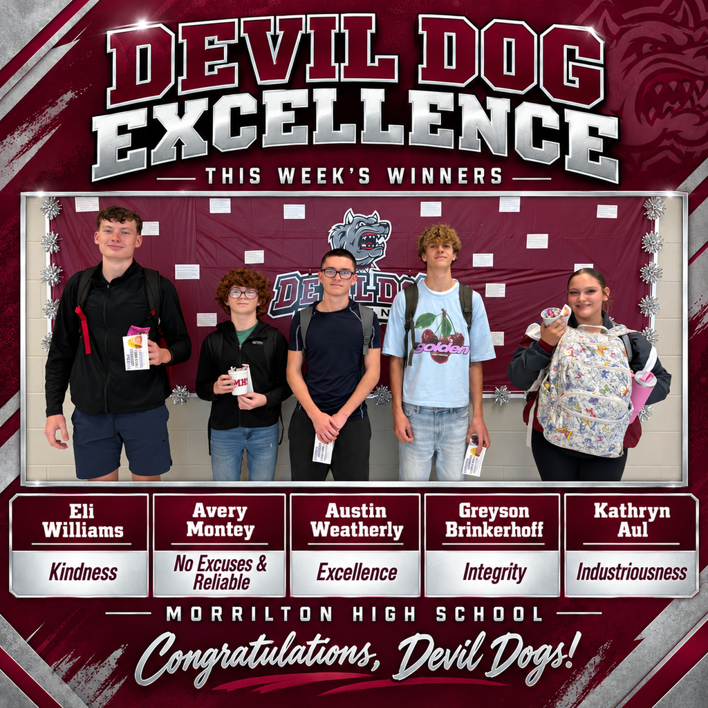 Five students stand next to each other. Each holds a card with a name and a virtue.