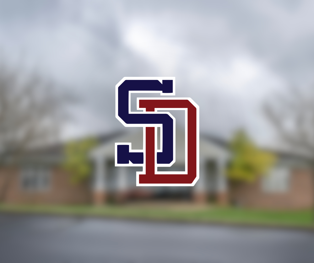 SDCSC logo over photo of central office building