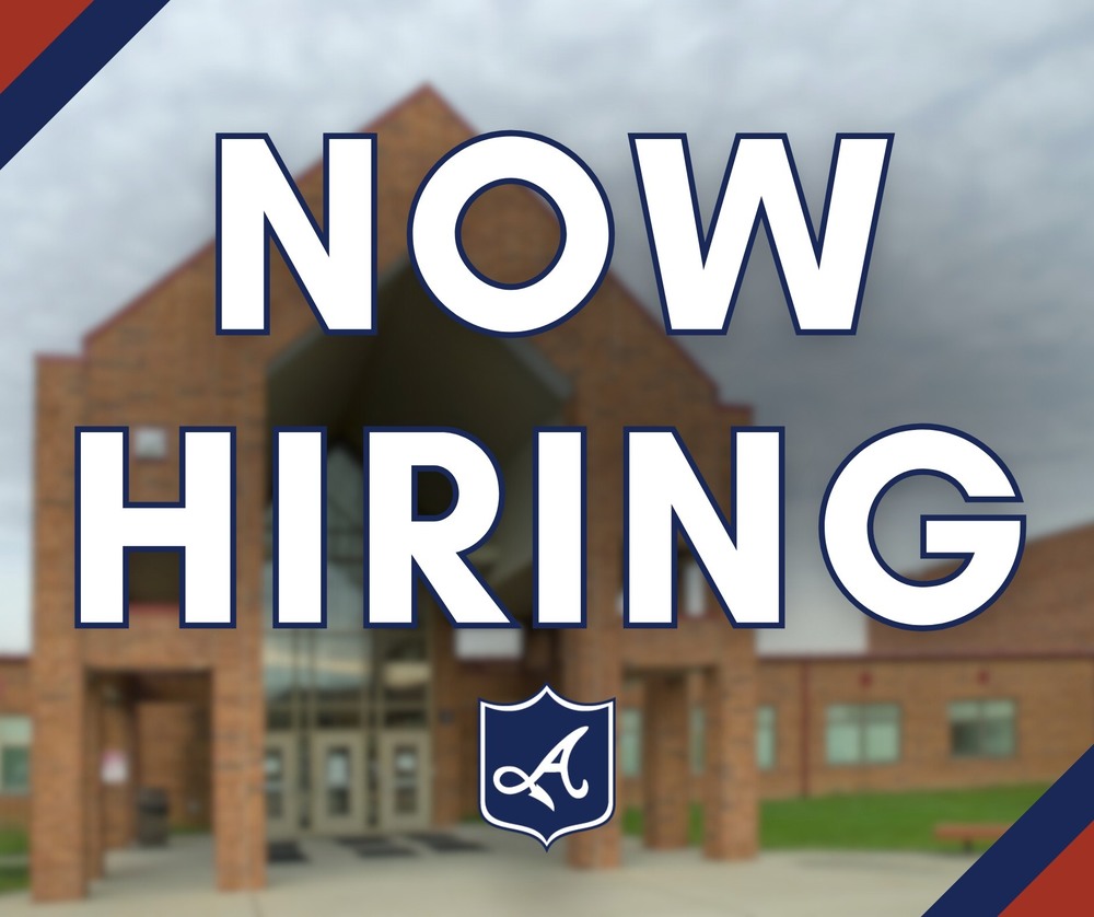 Photo of AES School with text overlayed reading "NOW HIRING"