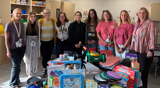 Pictured are the preschool staff at Dillsboro Elementary School and Aurora Elementary School: Courtney Wanstrath, Shianna Blair, Gina Oles, Tiffney Forand, Ashley Hartman, Chelsie Willison, and Heather Nix along with Director of Advancement, Karen Snyder of UWGC & SE Indiana, and SDCSC Director of Community Partnerships Mary Bailey.