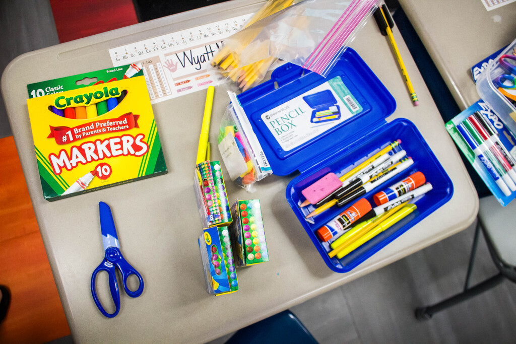 Mrs. McNamara's class organizes their supplies.