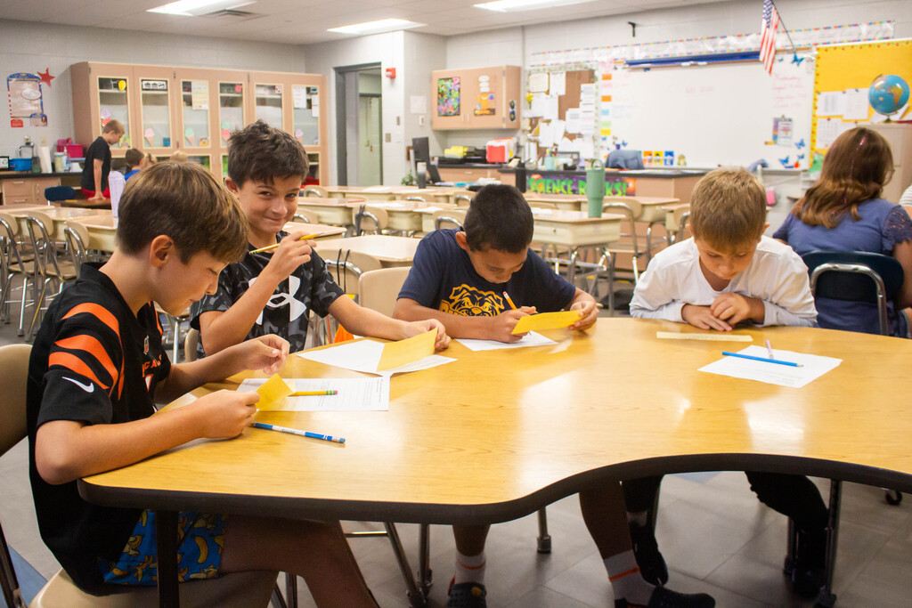 Fifth-grade DES students learn to sequence events together.