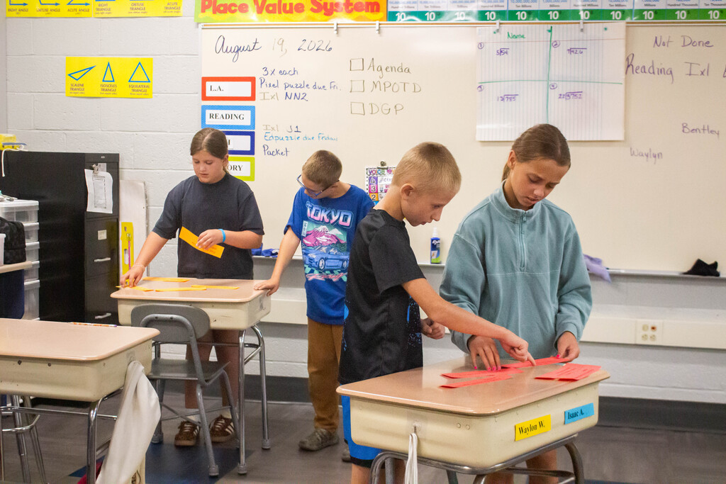 Fifth-grade DES students learn to sequence events together.