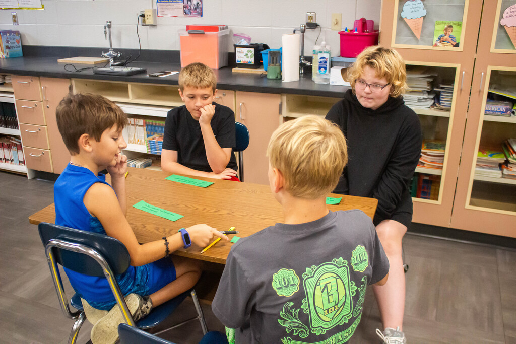 Fifth-grade DES students learn to sequence events together.