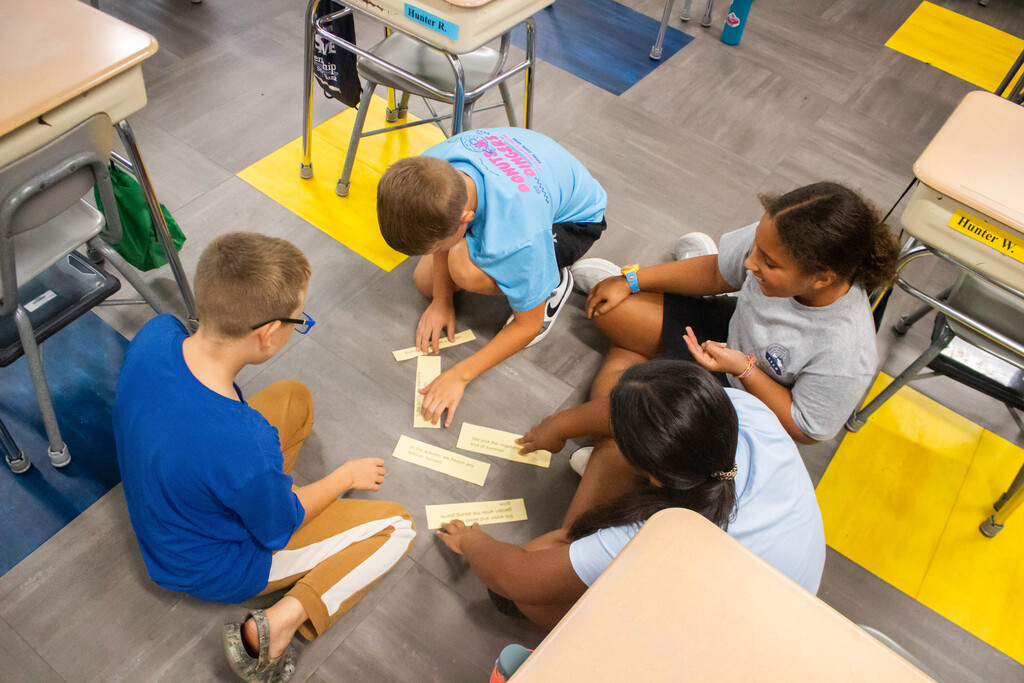 Fifth-grade DES students learn to sequence events together.
