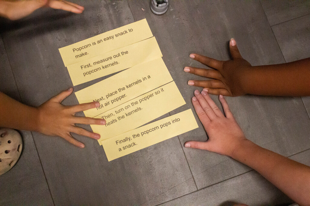 Fifth-grade DES students learn to sequence events together.