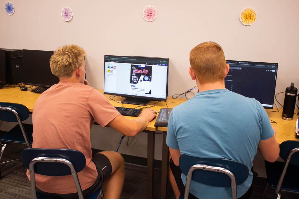 SDHS students design real flyers for the athletic department