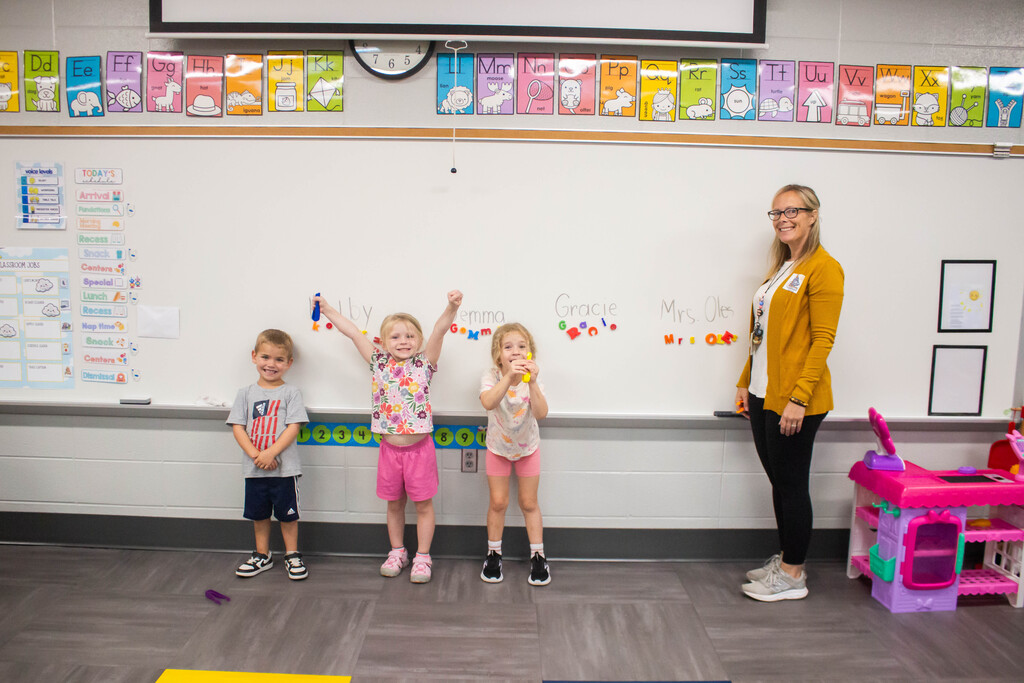 DES Preschool students practice spelling their name