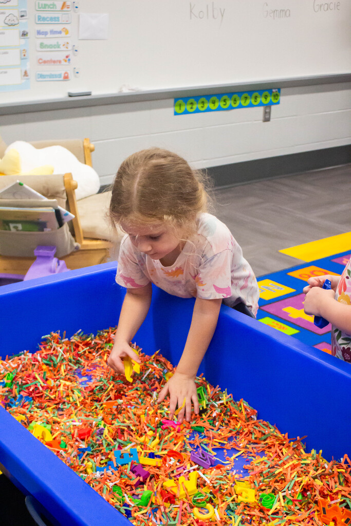 DES Preschool students practice spelling their name