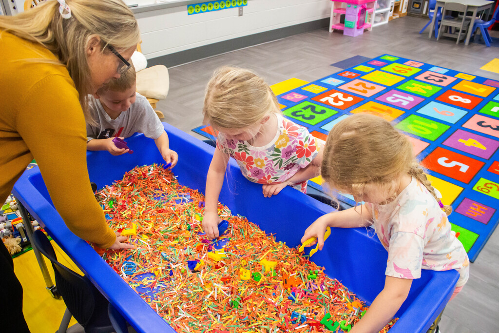 DES Preschool students practice spelling their name