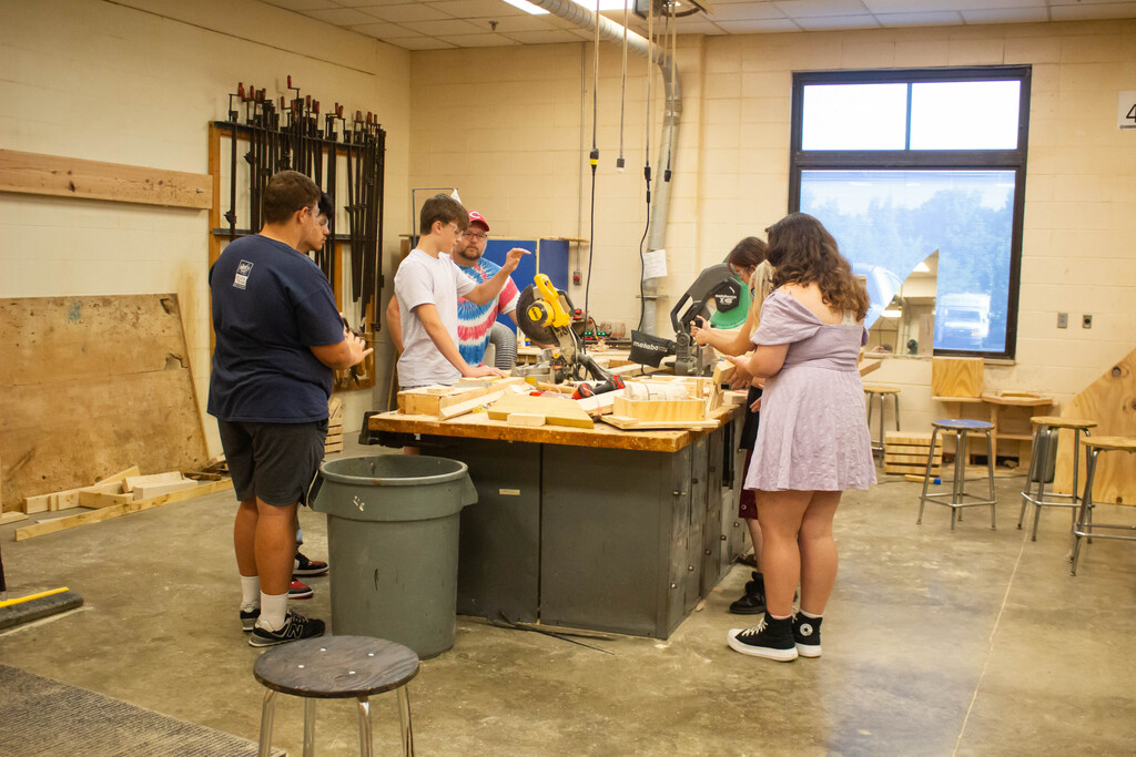 SDHS students practice woodshop safety.