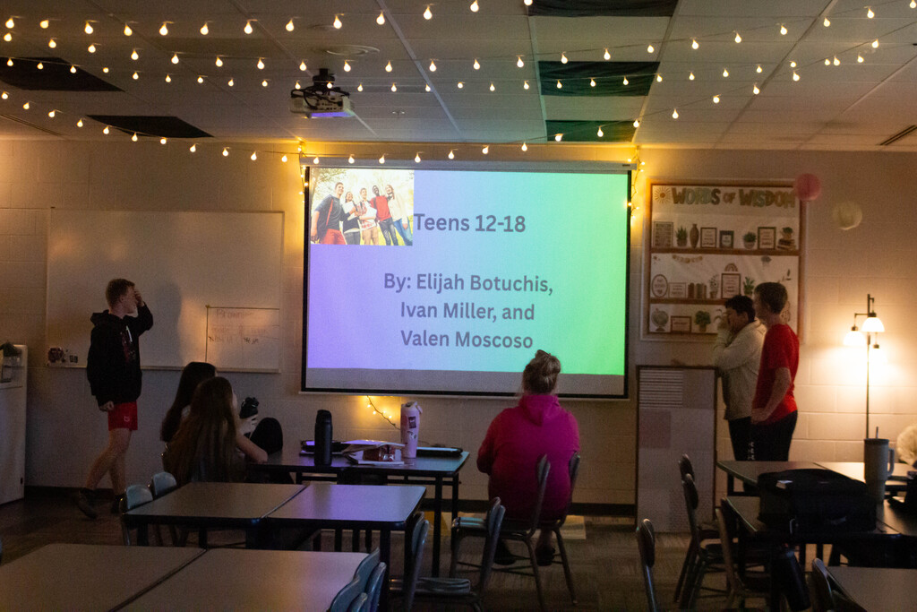 SDMS students present their research on child development stages.