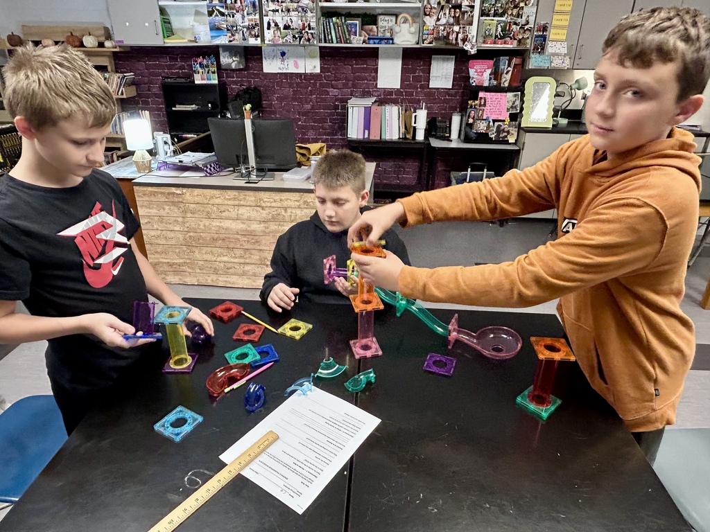 SDMS students studying physical forces through 3 labs.