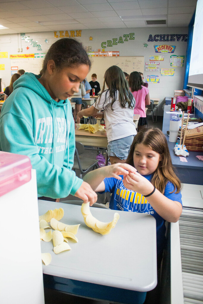 DES students engineer a free standing Pringle ring.