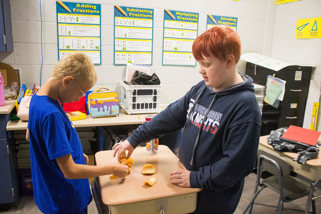 DES students engineer a free standing Pringle ring.