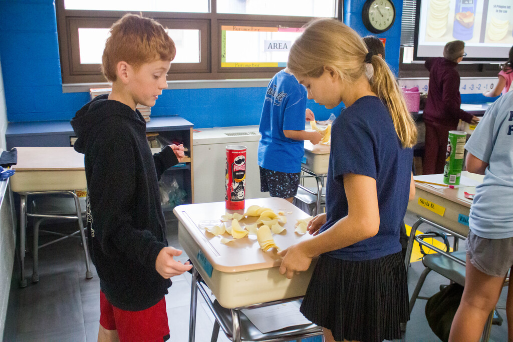 DES students engineer a free standing Pringle ring.