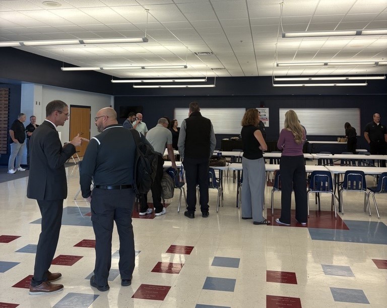 picture of people standing and talking