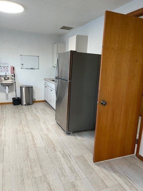 picture of kitchen including refrigerator 