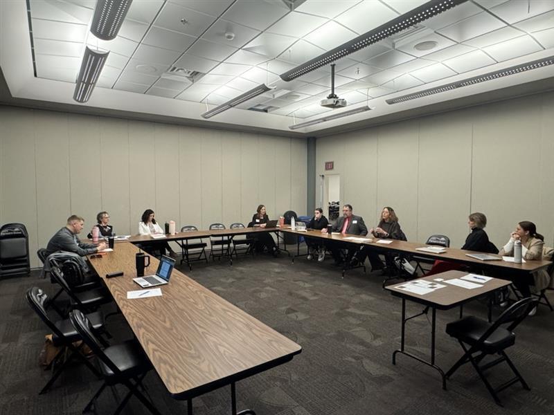 people talking around table